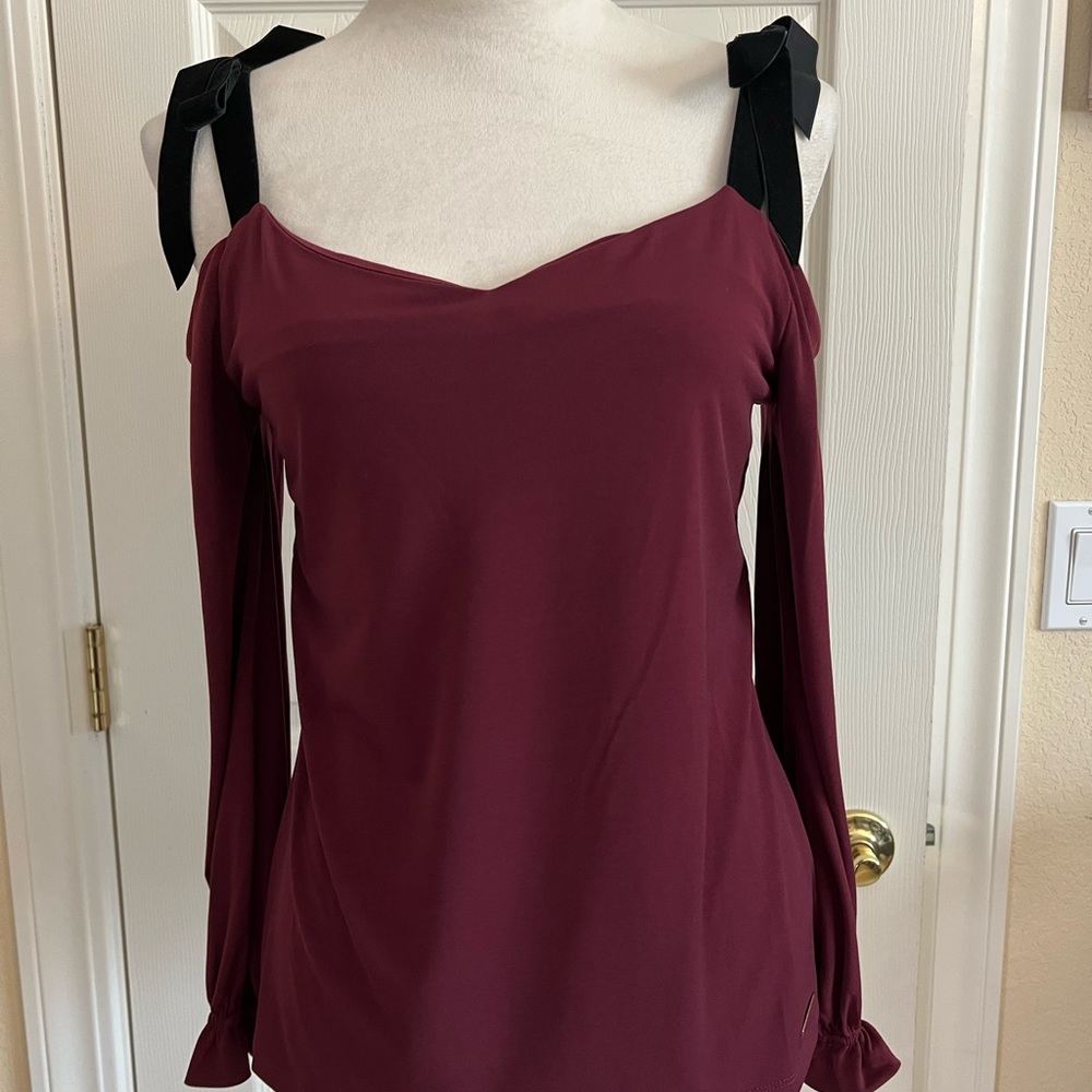 Michael Kors velvet, bowties, peekaboo blouse